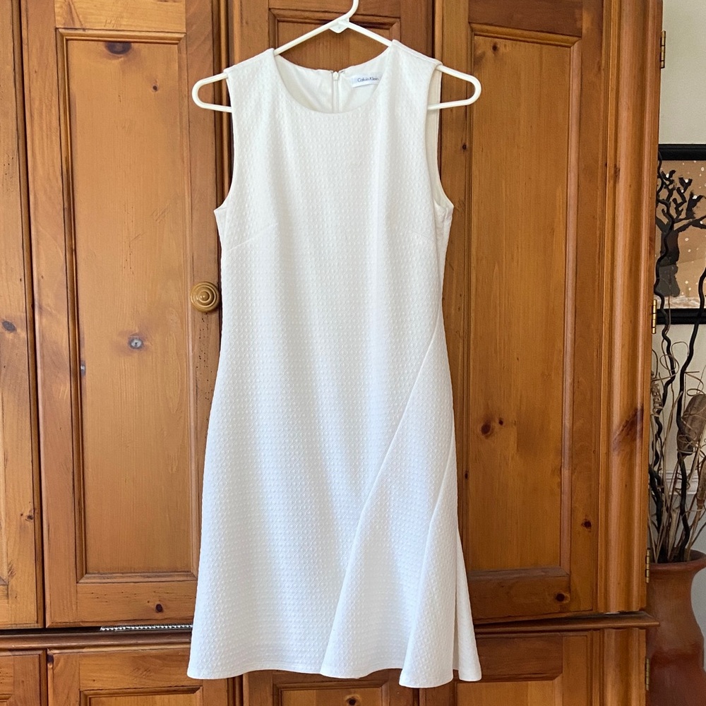Calvin Klein lined dress 
Approximately 16” armpit to armpit and 
36” length